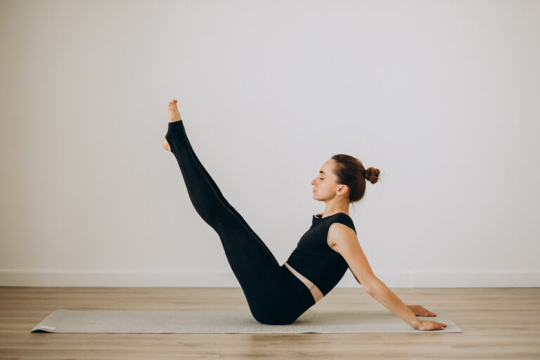 Woman practice pilates at yoga gym